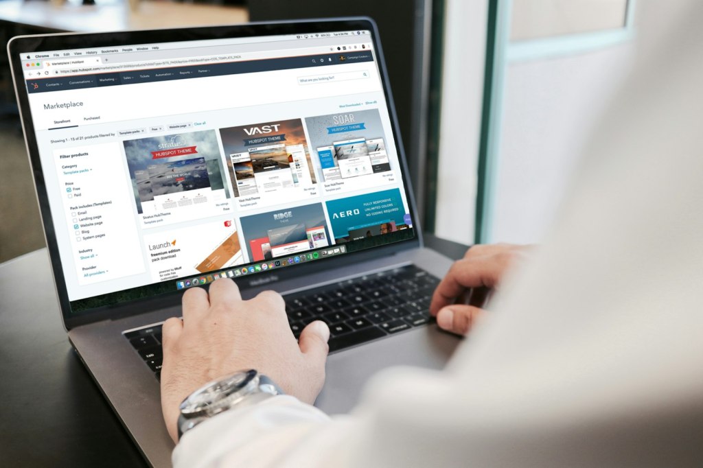 Someone reviewing a website on a laptop